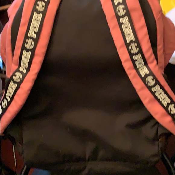 Pink back pack with large logo on bottom. - Picture 8 of 8